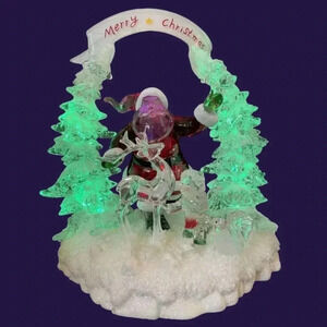 Heritage ice sculpture merry christmas santa lighted
